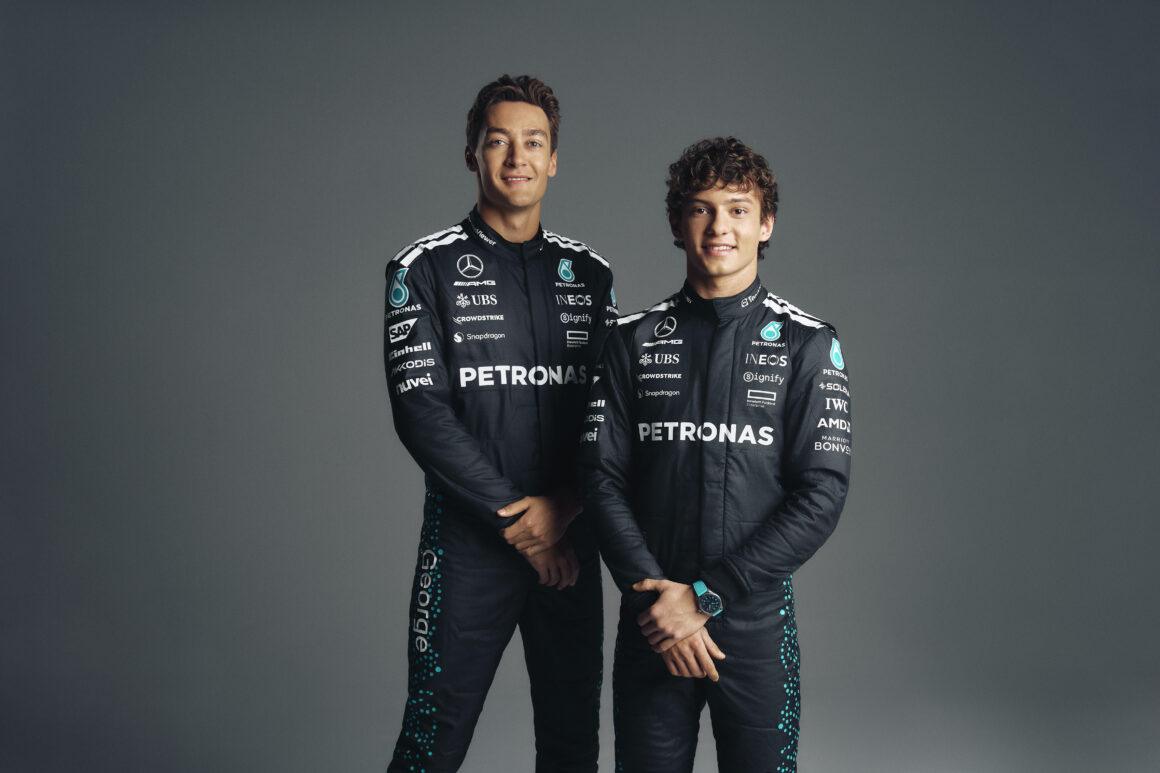 a couple of men standing next to each other